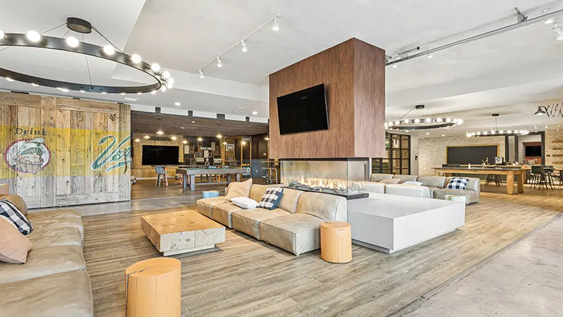Quiet, well-lit resident study library with co-working tables at Landmark on Grand River